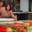 Anya Singh participating in a cooking class in Southeast Asia.